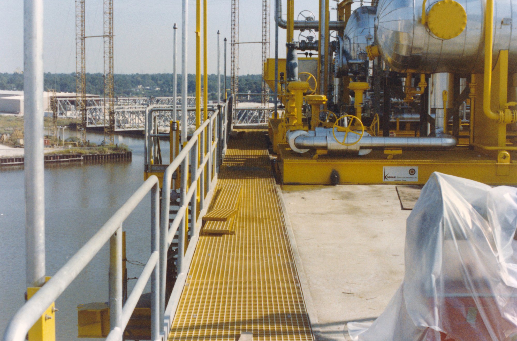 Yellow square mesh grating in a marine environment