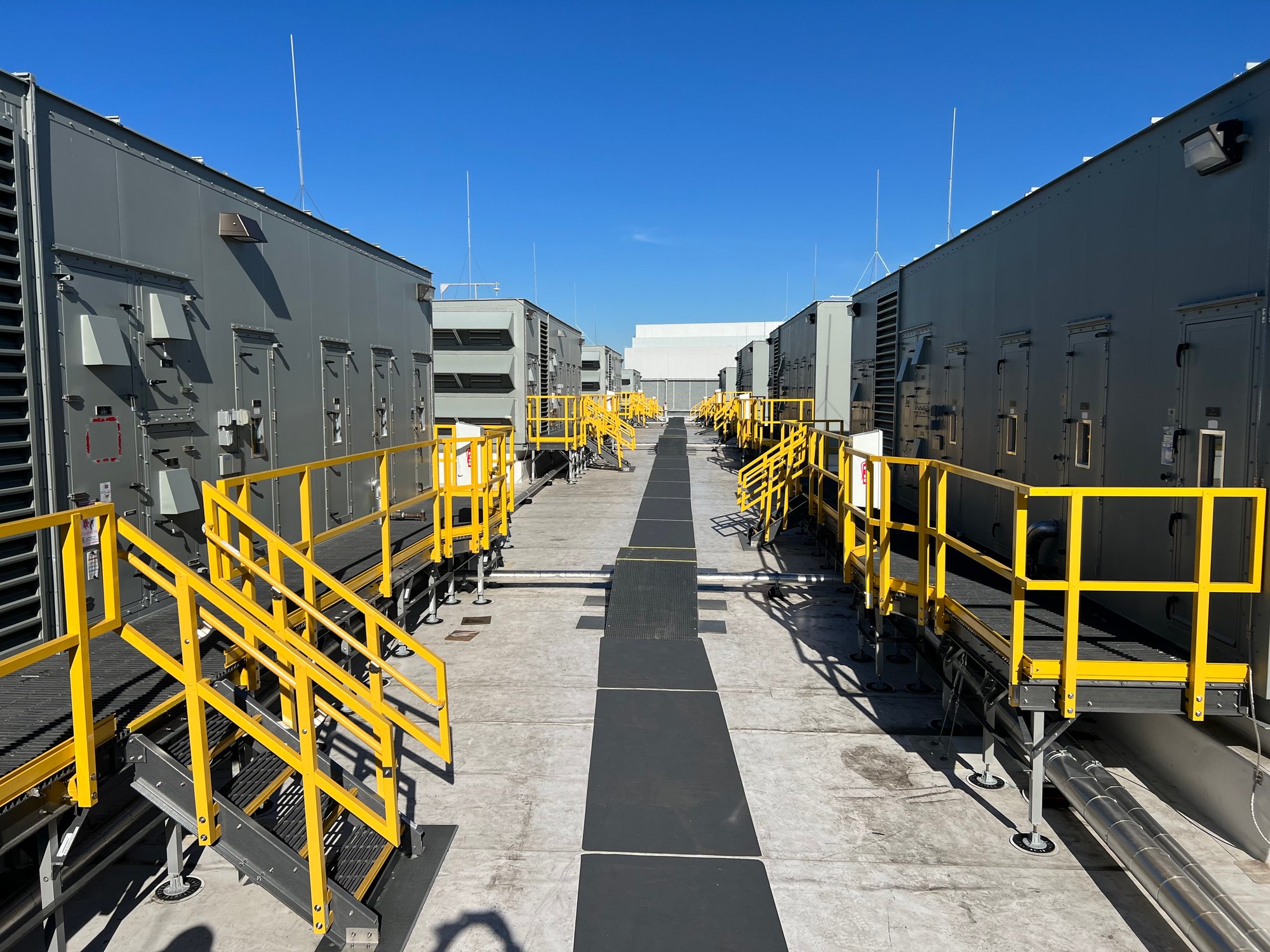 Stair safety treads and railings on a data center platform