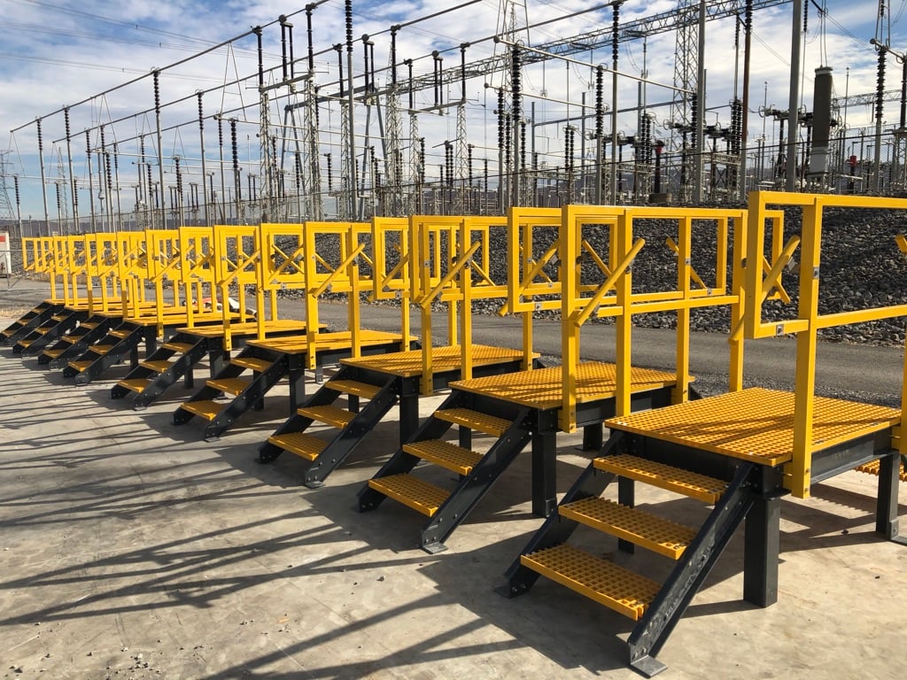 Stair crossover platforms at utility facility